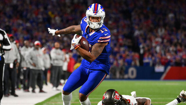 ORCHARD PARK, NEW YORK - OCTOBER 26: Gabe Davis #13 of the Buffalo Bills carries the ball against the Tampa Bay Buccaneers during the second half of the game at Highmark Stadium on October 26, 2023 in Orchard Park, New York.