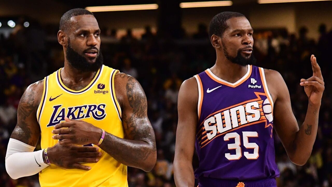 PALM SPRINGS, CA - OCTOBER 19: LeBron James #23 of the Los Angeles Lakers and Kevin Durant #35 of the Phoenix Suns looks on during the game during the game on October 19, 2023 at the Acrisure Arena in Palm Springs, California. NOTE TO USER: User expressly acknowledges and agrees that, by downloading and/or using this Photograph, user is consenting to the terms and conditions of the Getty Images License Agreement. Mandatory Copyright Notice: Copyright 2023 NBAE