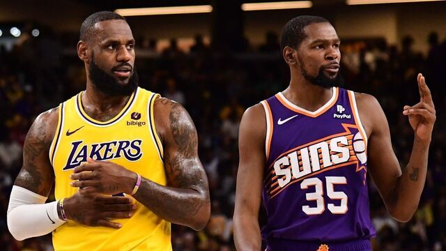 PALM SPRINGS, CA - OCTOBER 19: LeBron James #23 of the Los Angeles Lakers and Kevin Durant #35 of the Phoenix Suns looks on during the game during the game on October 19, 2023 at the Acrisure Arena in Palm Springs, California. NOTE TO USER: User expressly acknowledges and agrees that, by downloading and/or using this Photograph, user is consenting to the terms and conditions of the Getty Images License Agreement. Mandatory Copyright Notice: Copyright 2023 NBAE