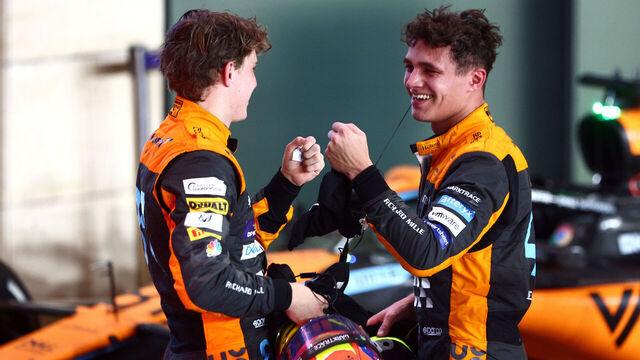 LUSAIL CITY, QATAR - OCTOBER 08: Second placed Oscar Piastri of Australia and McLaren and Third placed Lando Norris of Great Britain and McLaren celebrate in parc ferme during the F1 Grand Prix of Qatar at Lusail International Circuit on October 08, 2023 in Lusail City, Qatar.
