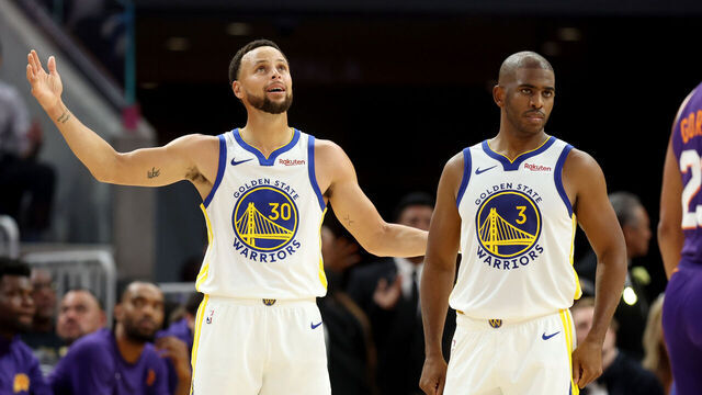 Golden State Warriors' Stephen Curry (30) reacts after a referee calls a foul on Curry as Golden State Warriors' Chris Paul (3) looks on in the first half of the season opener against the Phoenix Suns at Chase Center in San Francisco, Calif., on Tuesday, Oct. 24, 2023.