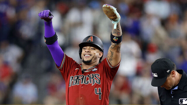 ARLINGTON, TEXAS - OCTOBER 27: Ketel Marte #4 of the Arizona Diamondbacks celebrates after stealing second base in the third inning against the Texas Rangers during Game One of the World Series at Globe Life Field on October 27, 2023 in Arlington, Texas.