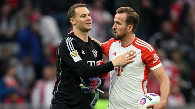 Bayern Munich's German goalkeeper #01 Manuel Neuer and Bayern Munich's English forward #09 Harry Kane walk on the pitch after the German first division Bundesliga football match between FC Bayern Munich and SV Darmstadt 98 in Munich, southern Germany on October 28, 2023.