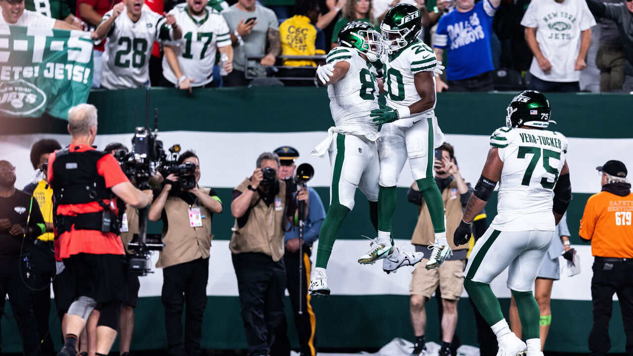 EAST RUTHERFORD, NEW JERSEY - OCTOBER 01: C.J. Uzomah #87 of the New York Jets celebrates with Breece Hall #20 after scoring a touchdown against the Kansas City Chiefs during the second quarter in the game at MetLife Stadium on October 01, 2023 in East Rutherford, New Jersey.