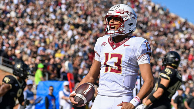 WINSTON-SALEM, NORTH CAROLINA - OCTOBER 28: Jordan Travis #13 of the Florida State Seminoles reacts after runing for a touchdown against the Wake Forest Demon Deacons during the first half of their game at Truist Field on October 28, 2023 in Winston-Salem, North Carolina.