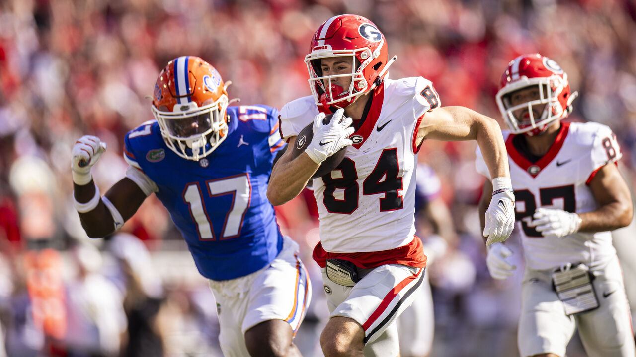 JACKSONVILLE, FLORIDA - OCTOBER 28: Ladd McConkey #84 of the Georgia Bulldogs scores a touchdown during the first half of a game against the Florida Gators at EverBank Stadium on October 28, 2023 in Jacksonville, Florida.