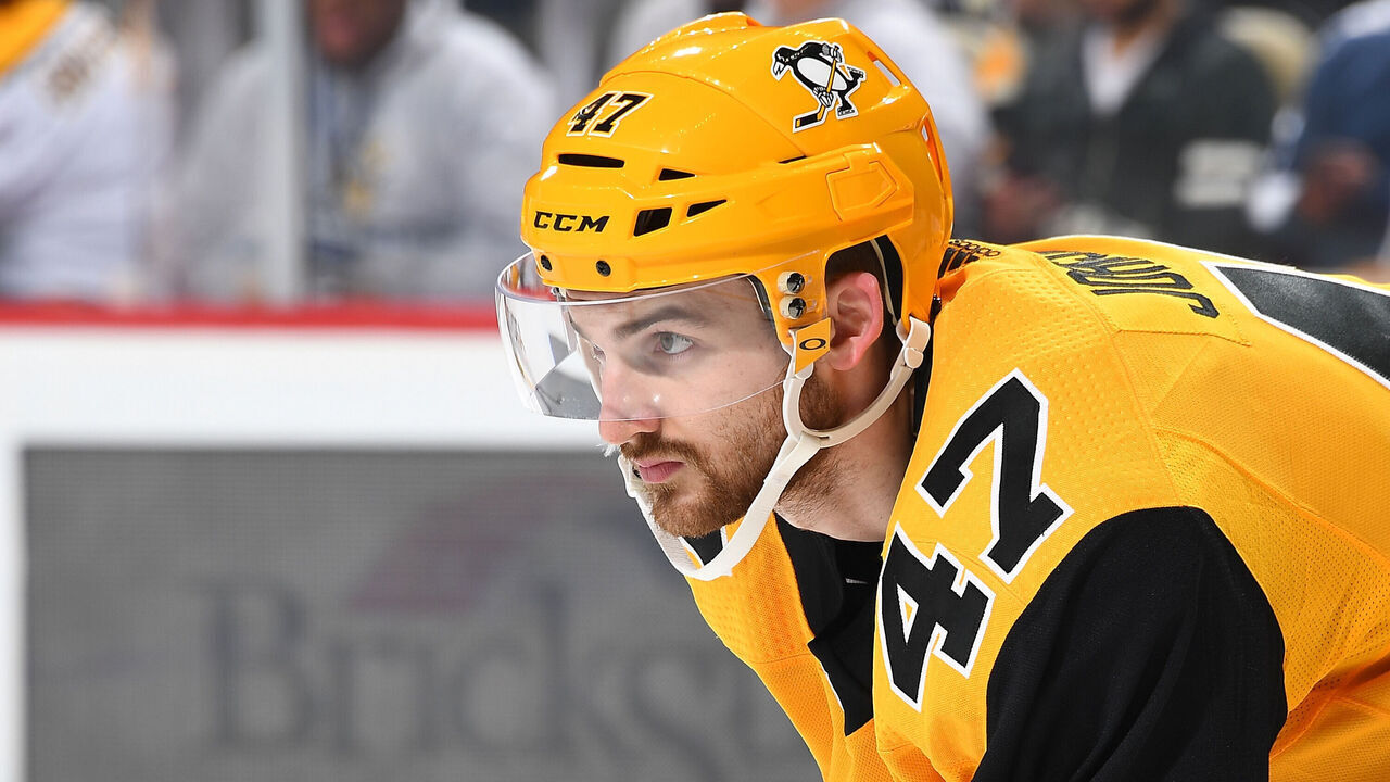 PITTSBURGH, PA - MARCH 29: Adam Johnson #47 of the Pittsburgh Penguins skates against the Nashville Predators at PPG Paints Arena on March 29, 2019 in Pittsburgh, Pennsylvania.