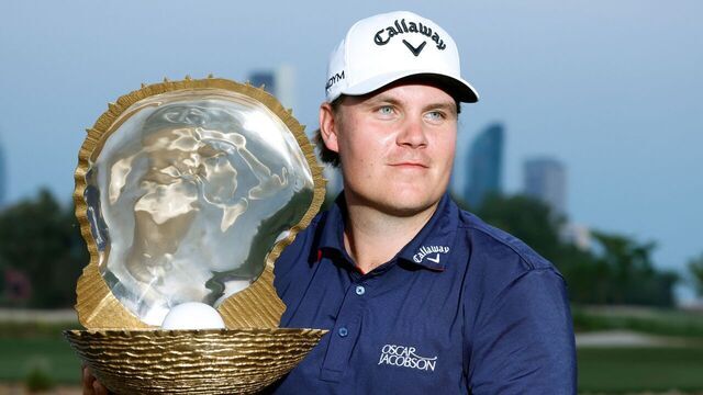 Finland's Sami Valimaki poses with the winner's trophy at the end of the European Tour's Qatar Masters, at the Doha Golf Club, in Doha on October 29, 2023.