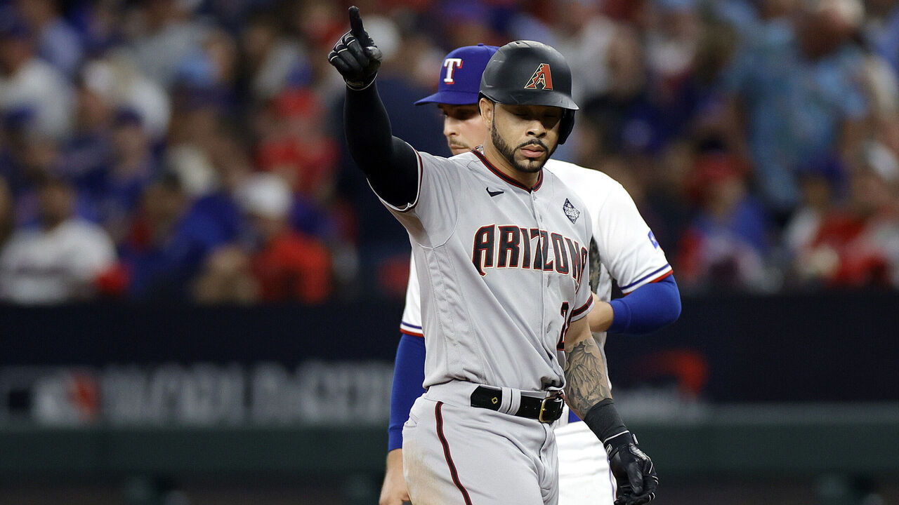 ARLINGTON, TEXAS - OCTOBER 28: Tommy Pham #28 of the Arizona Diamondbacks celebrates after hitting a single in the eighth inning against the Texas Rangers during Game Two of the World Series at Globe Life Field on October 28, 2023 in Arlington, Texas.