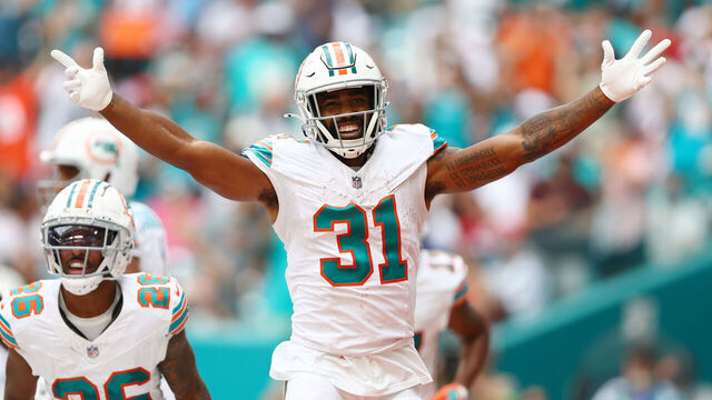 MIAMI GARDENS, FLORIDA - OCTOBER 29: Raheem Mostert #31 of the Miami Dolphins celebrates after his rushing touchdown during the third quarter against the New England Patriots at Hard Rock Stadium on October 29, 2023 in Miami Gardens, Florida.