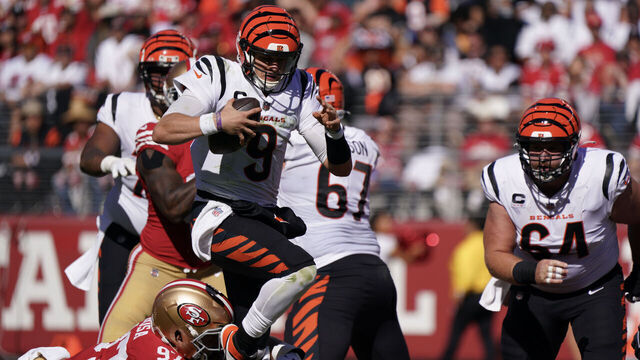 SANTA CLARA, CALIFORNIA - OCTOBER 29: Joe Burrow #9 of the Cincinnati Bengals is tackled by Nick Bosa #97 of the San Francisco 49ers during the second quarter of the game at Levi's Stadium on October 29, 2023 in Santa Clara, California.