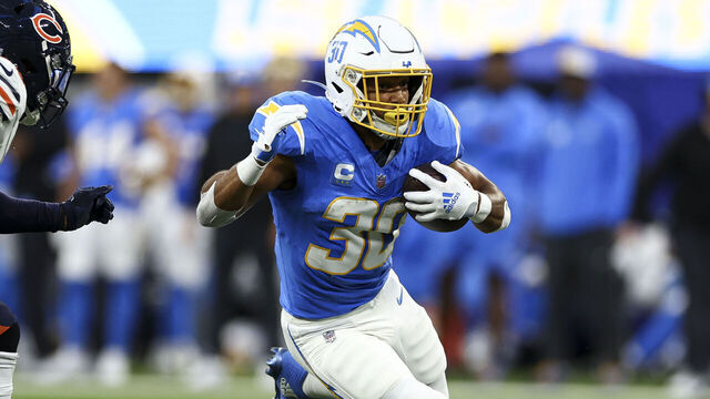 INGLEWOOD, CA - OCTOBER 29: Austin Ekeler #30 of the Los Angeles Chargers carries the ball during the first quarter of an NFL football game against the Chicago Bears at SoFi Stadium on October 29, 2023 in Inglewood, California.