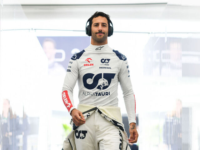 MEXICO CITY, MEXICO - OCTOBER 28: Daniel Ricciardo of Australia and Scuderia AlphaTauri walks in the garage during qualifying ahead of the F1 Grand Prix of Mexico at Autodromo Hermanos Rodriguez on October 28, 2023 in Mexico City, Mexico.