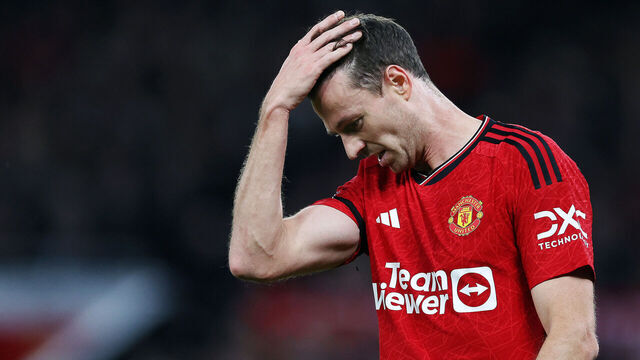 MANCHESTER, ENGLAND - OCTOBER 29: Jonny Evans of Manchester United looks dejected after Erling Haaland of Manchester City (not pictured) scores his team's second goal during the Premier League match between Manchester United and Manchester City at Old Trafford on October 29, 2023 in Manchester, England.