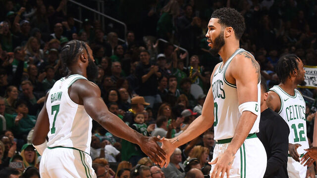 BOSTON, MA - OCTOBER 8: Jaylen Brown #7, Jayson Tatum #0 and Jrue Holiday #4 of the Boston Celtics celebrates against the Philadelphia 76ers on October 8, 2023 at the TD Garden in Boston, Massachusetts. Mandatory Copyright Notice: Copyright 2023 NBAE