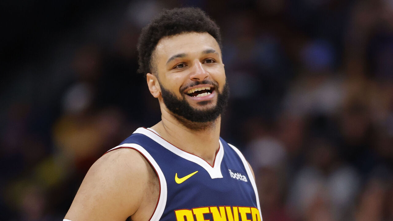 DENVER, COLORADO - OCTOBER 30: Jamal Murray #27 of the Denver Nuggets reacts against the Utah Jazz during the second quarter at Ball Arena on October 30, 2023 in Denver, Colorado.