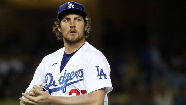 LOS ANGELES, CALIFORNIA - JUNE 12: Trevor Bauer #27 of the Los Angeles Dodgers looks on after giving up a hit to Joey Gallo #13 of the Texas Rangers during the fifth inning at Dodger Stadium on June 12, 2021 in Los Angeles, California.