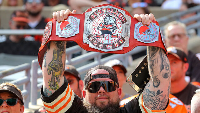 CLEVELAND, OH - SEPTEMBER 18: A Cleveland Browns fan holds up a championship belt during the third quarter of the National Football League game between the New York Jets and Cleveland Browns on September 18, 2022, at FirstEnergy Stadium in Cleveland, OH.