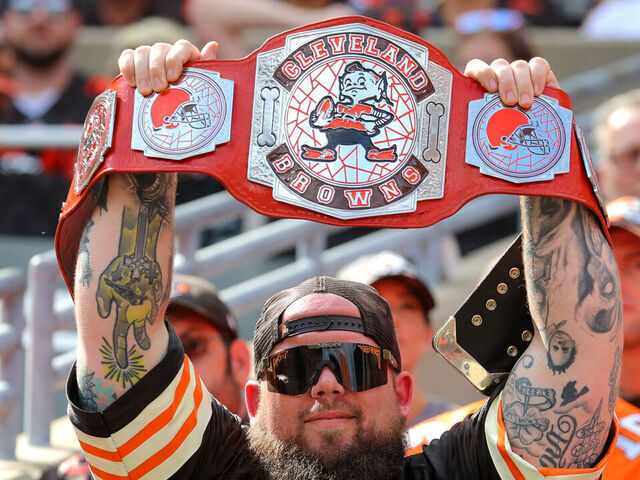CLEVELAND, OH - SEPTEMBER 18: A Cleveland Browns fan holds up a championship belt during the third quarter of the National Football League game between the New York Jets and Cleveland Browns on September 18, 2022, at FirstEnergy Stadium in Cleveland, OH.