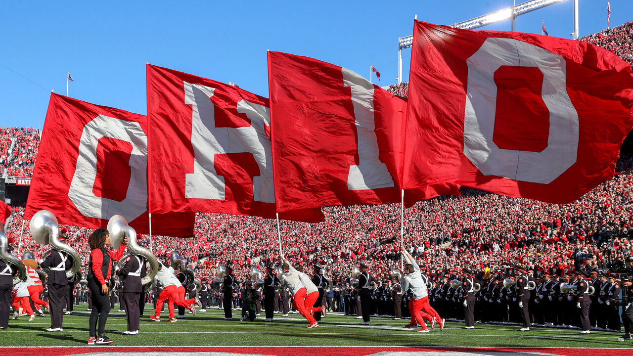 COLUMBUS, OH - NOVEMBER 26: The Ohio State Buckeyes dance team and cheerleaders lead the Buckeyes on the the field prior to the college football game between the Michigan Wolverines and Ohio State Buckeyes on November 26, 2022, at Ohio Stadium in Columbus, OH.