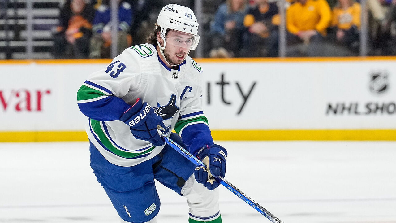 NASHVILLE, TENNESSEE - OCTOBER 24: Quinn Hughes #43 of the Vancouver Canucks skates against the Nashville Predators during an NHL game at Bridgestone Arena on October 24, 2023 in Nashville, Tennessee.