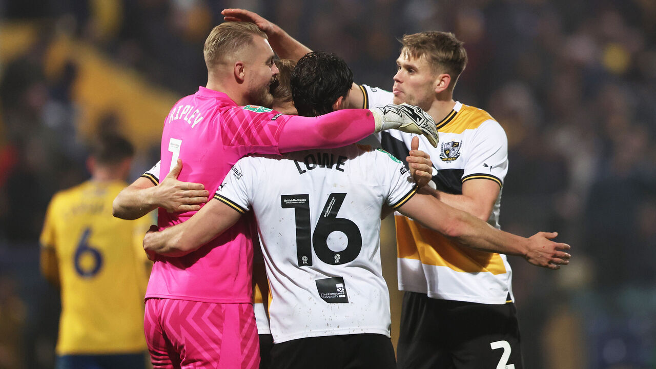 MANSFIELD, ENGLAND - OCTOBER 31: Connor Ripley, Jason Lowe and Lewis Cass of Port Vale celebrate victory following the Carabao Cup Fourth Round match between Mansfield Town and Port Vale at Field Mill on October 31, 2023 in Mansfield, England.