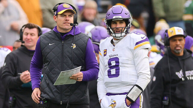 GREEN BAY, WISCONSIN - OCTOBER 29: Kirk Cousins #8 of the Minnesota Vikings talks with head coach Kevin O'Connell during the third quarter against the Minnesota Vikings at Lambeau Field on October 29, 2023 in Green Bay, Wisconsin.