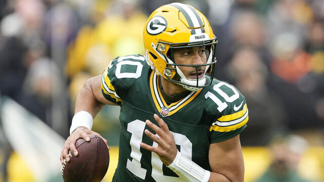 GREEN BAY, WISCONSIN - OCTOBER 29: Jordan Love #10 of the Green Bay Packers scrambles with the ball during the second quarter against the Minnesota Vikings at Lambeau Field on October 29, 2023 in Green Bay, Wisconsin.