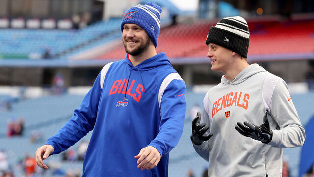 ORCHARD PARK, NEW YORK - JANUARY 22: (L-R) Josh Allen #17 of the Buffalo Bills talks with Joe Burrow #9 of the Cincinnati Bengals prior to the AFC Divisional Playoff game at Highmark Stadium on January 22, 2023 in Orchard Park, New York.