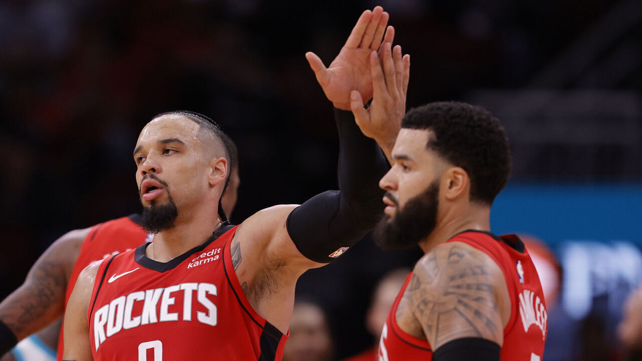 HOUSTON, TEXAS - NOVEMBER 01: Dillon Brooks #9 of the Houston Rockets high fives Fred VanVleet#5 of the Houston Rockets during the second half against the Charlotte Hornets at Toyota Center on November 01, 2023 in Houston, Texas.