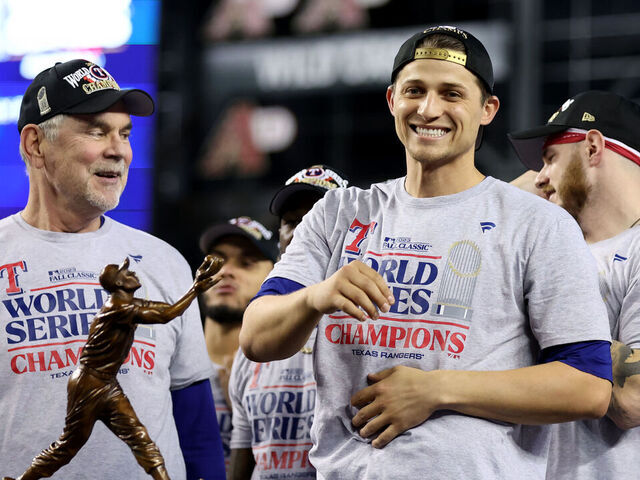 PHOENIX, ARIZONA - NOVEMBER 01: Corey Seager #5 of the Texas Rangers celebrates after the Texas Rangers beat the Arizona Diamondbacks 5-0 in Game Five to win the World Series at Chase Field on November 01, 2023 in Phoenix, Arizona.