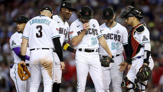 PHOENIX, ARIZONA - NOVEMBER 01: Zac Gallen #23 of the Arizona Diamondbacks reacts to being relieved in the seventh inning against the Texas Rangers during Game Five of the World Series at Chase Field on November 01, 2023 in Phoenix, Arizona.