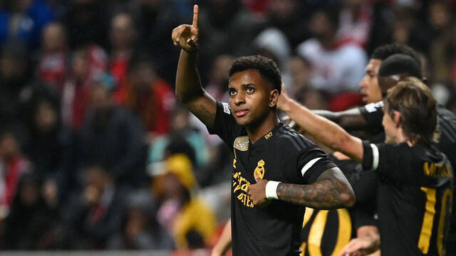 TOPSHOT - Real Madrid's Brazilian forward #11 Rodrygo celebrates after scoring his team's first goal during the UEFA Champions League 1st round day 3 Group C football match between SC Braga and Real Madrid CF at the Municipal stadium of Braga on October 24, 2023.
