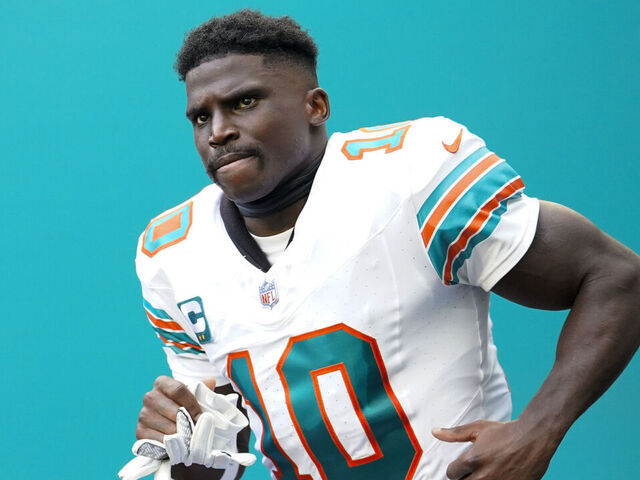 MIAMI GARDENS, FLORIDA - OCTOBER 29: Tyreek Hill #10 of the Miami Dolphins enters the field prior to a game against the New England Patriots at Hard Rock Stadium on October 29, 2023 in Miami Gardens, Florida.