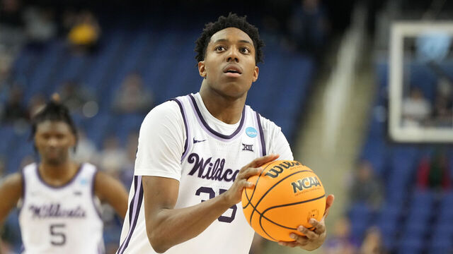 GREENSBORO, NORTH CAROLINA - MARCH 17: NaeQwan Tomlin #35 of the Kansas State Wildcats takes a foul shot during the first round of the 2023 NCAA Men's Basketball Tournament game against the Montana State Bobcats at Greensboro Coliseum on March 17, 2023 in Greensboro, North Carolina.