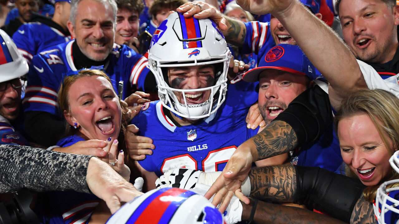 ORCHARD PARK, NEW YORK - OCTOBER 26: Dalton Kincaid #86 of the Buffalo Bills celebrates his touchdown with teammates and fans against the Tampa Bay Buccaneers during the first half at Highmark Stadium on October 26, 2023 in Orchard Park, New York.