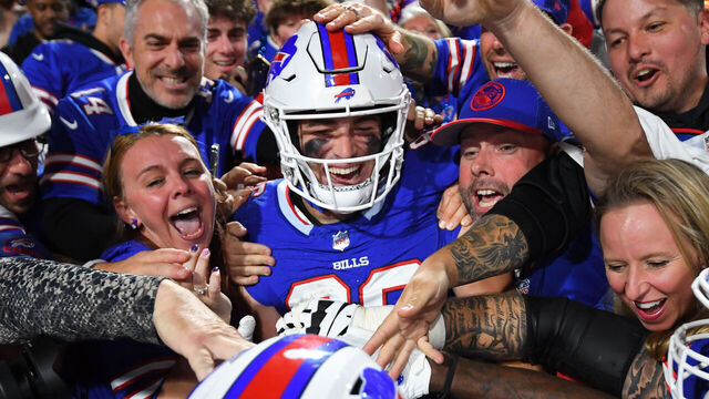 ORCHARD PARK, NEW YORK - OCTOBER 26: Dalton Kincaid #86 of the Buffalo Bills celebrates his touchdown with teammates and fans against the Tampa Bay Buccaneers during the first half at Highmark Stadium on October 26, 2023 in Orchard Park, New York.