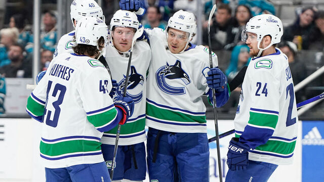 SAN JOSE, CALIFORNIA - NOVEMBER 2: Brock Boeser #6 celebrating with teammates against the San Jose Sharks at SAP Center on November 2, 2023 in San Jose, California.