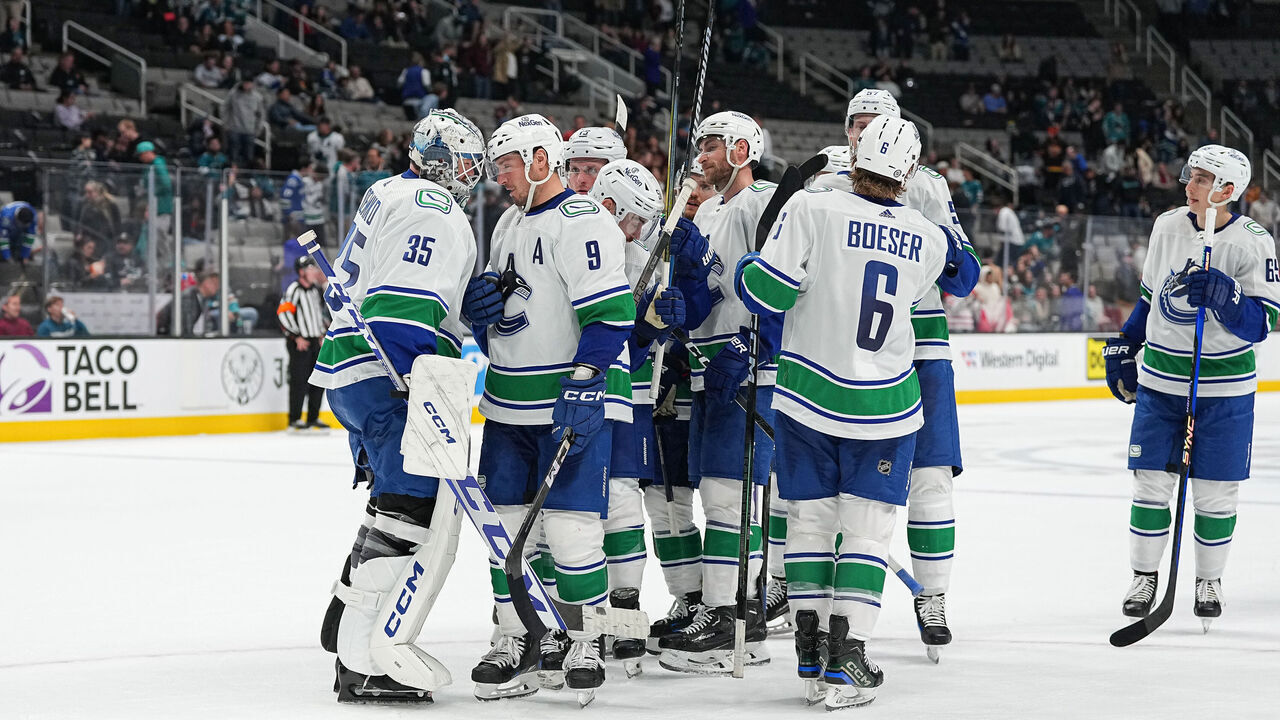 SAN JOSE, CA - NOVEMBER 2: The Vancouver Canucks celebrate the win against the San Jose Sharks at SAP Center on November 2, 2023 in San Jose, California.