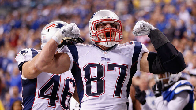 INDIANAPOLIS, IN - NOVEMBER 16: Rob Gronkowski #87 of the New England Patriots celebrates his touchdown against the Indianapolis Colts during the fourth quarter of the game at Lucas Oil Stadium on November 16, 2014 in Indianapolis, Indiana.