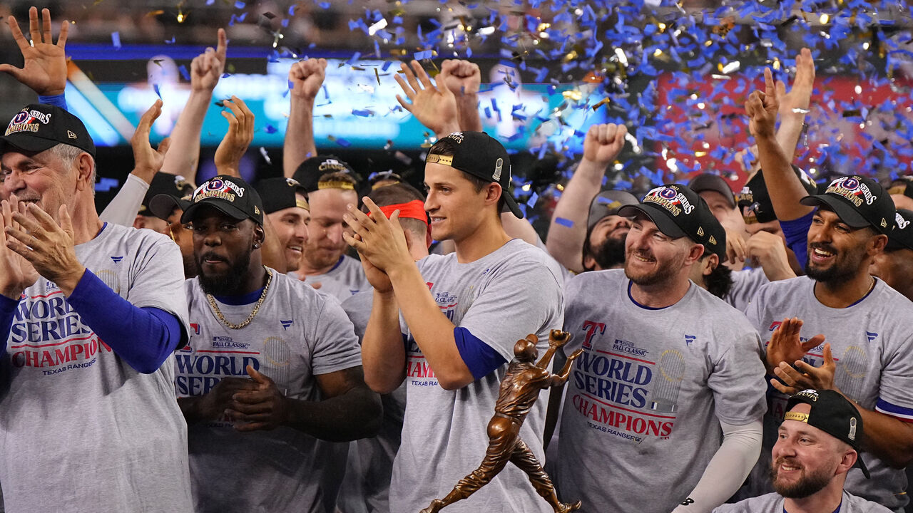 Baseball: World Series: Texas Rangers Corey Seager (5) poses victorious with the Willie Mays Most Valuable Player award after winning game and series vs Arizona Diamondbacks at Chase Field. Game 5. Phoenix, AZ 11/1/2023 CREDIT: Erick W. Rasco (Set Number: X164452 TK1)