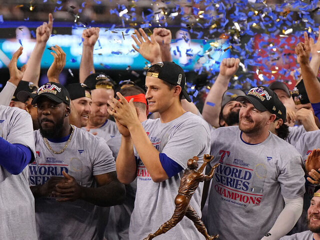 Baseball: World Series: Texas Rangers Corey Seager (5) poses victorious with the Willie Mays Most Valuable Player award after winning game and series vs Arizona Diamondbacks at Chase Field. Game 5. Phoenix, AZ 11/1/2023 CREDIT: Erick W. Rasco (Set Number: X164452 TK1)