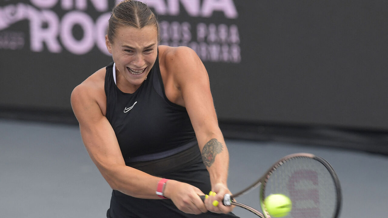 Belarus' Aryna Sabalenka returns the ball against Kazakhstan's Elena Rybakina during their women's singles match of the WTA Finals tennis championships in Cancun, Mexico, on November 3, 2023.