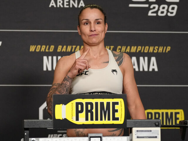 VANCOUVER, BRITISH COLUMBIA - JUNE 09: Raquel Pennington poses on the scale during the UFC 289 official weigh-in at the Westin Bayshore on June 09, 2023 in Vancouver, British Columbia.