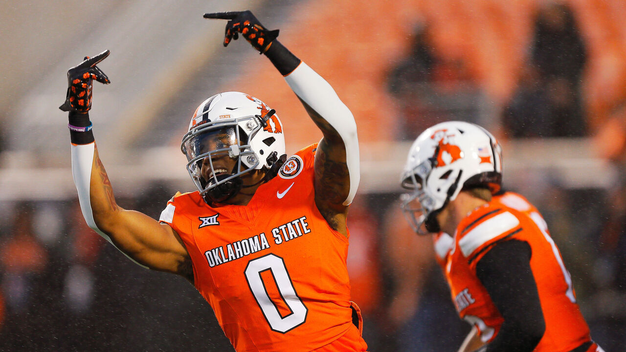 STILLWATER, OK - OCTOBER 28: Running back Ollie Gordon II #0 of the Oklahoma State Cowboys leads the team onto the field before a game against the Cincinnati Bearcats at Boone Pickens Stadium on October 28, 2023 in Stillwater, Oklahoma.