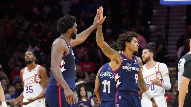 PHILADELPHIA, PA - NOVEMBER 4: Joel Embiid #21 high fives Kelly Oubre Jr. #9 of the Philadelphia 76ers during the game against the Phoenix Suns on November 4, 2023 at the Wells Fargo Center in Philadelphia, Pennsylvania NOTE TO USER: User expressly acknowledges and agrees that, by downloading and/or using this Photograph, user is consenting to the terms and conditions of the Getty Images License Agreement. Mandatory Copyright Notice: Copyright 2023 NBAE