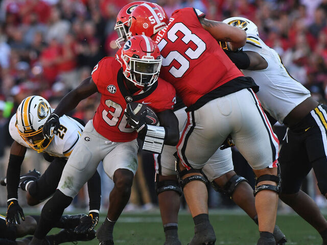 ATHENS, GA - NOVEMBER 04: Georgia Bulldogs Running Back Daijun Edwards (30) rushes the ball during the college football game between the Missouri Tigers and the Georgia Bulldogs on November 04, 2023, at Sanford Stadium in Athens, GA.