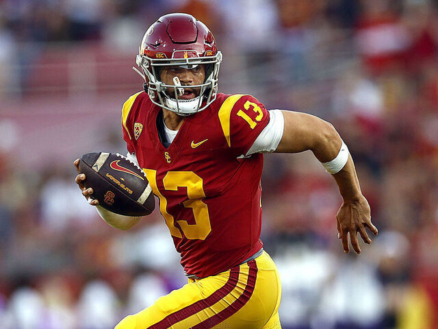 LOS ANGELES, CALIFORNIA - NOVEMBER 04: Caleb Williams #13 of the USC Trojans runs the ball against the Washington Huskies in the first quarter at United Airlines Field at the Los Angeles Memorial Coliseum on November 04, 2023 in Los Angeles, California.