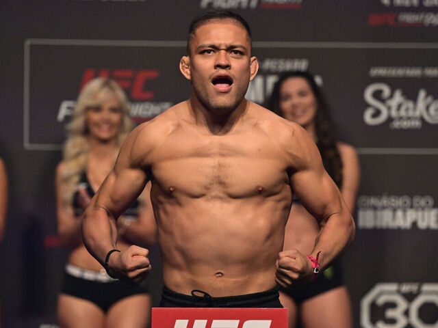 SAO PAULO, BRAZIL - NOVEMBER 03: Elves Brener of Brazil poses on the scale during the UFC Fight Night ceremonial weigh-in at Ibirapuera Gymnasium on November 03, 2023 in Sao Paulo, Brazil.