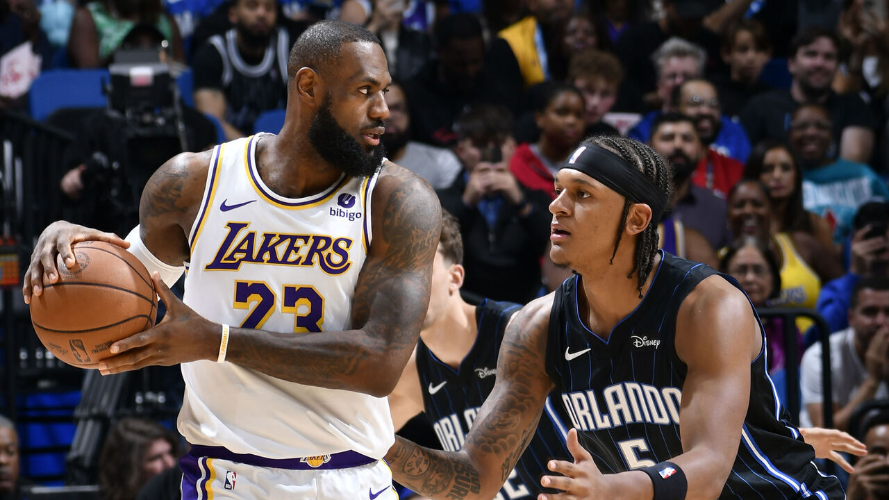 ORLANDO, FL - NOVEMBER 4: Paolo Banchero #5 of the Orlando Magic plays defense against LeBron James #23 of the Los Angeles Lakers on November 4, 2023 at Amway Center in Orlando, Florida. Mandatory Copyright Notice: Copyright 2023 NBAE